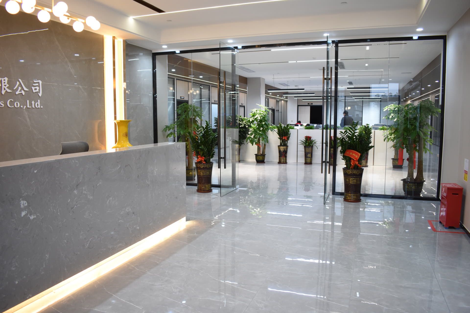 Glass entrance to the Leutoo offices and factory floor