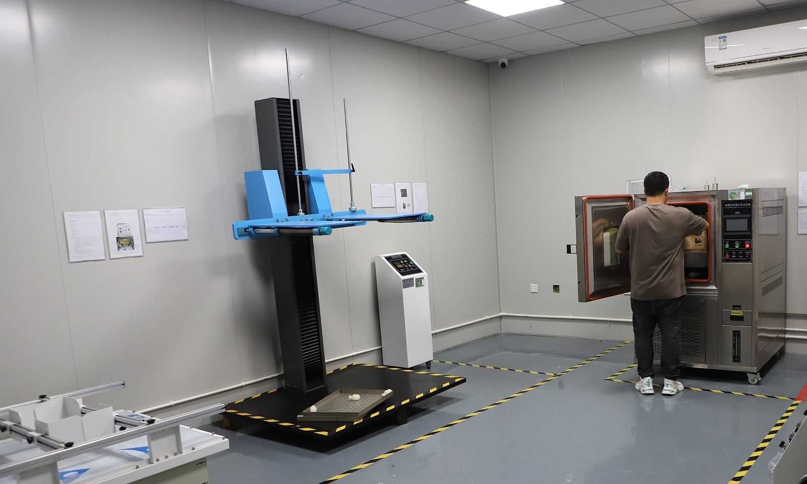 Leutoo reliability lab with a drop tester, transport vibration table and temperature and humidity chamber