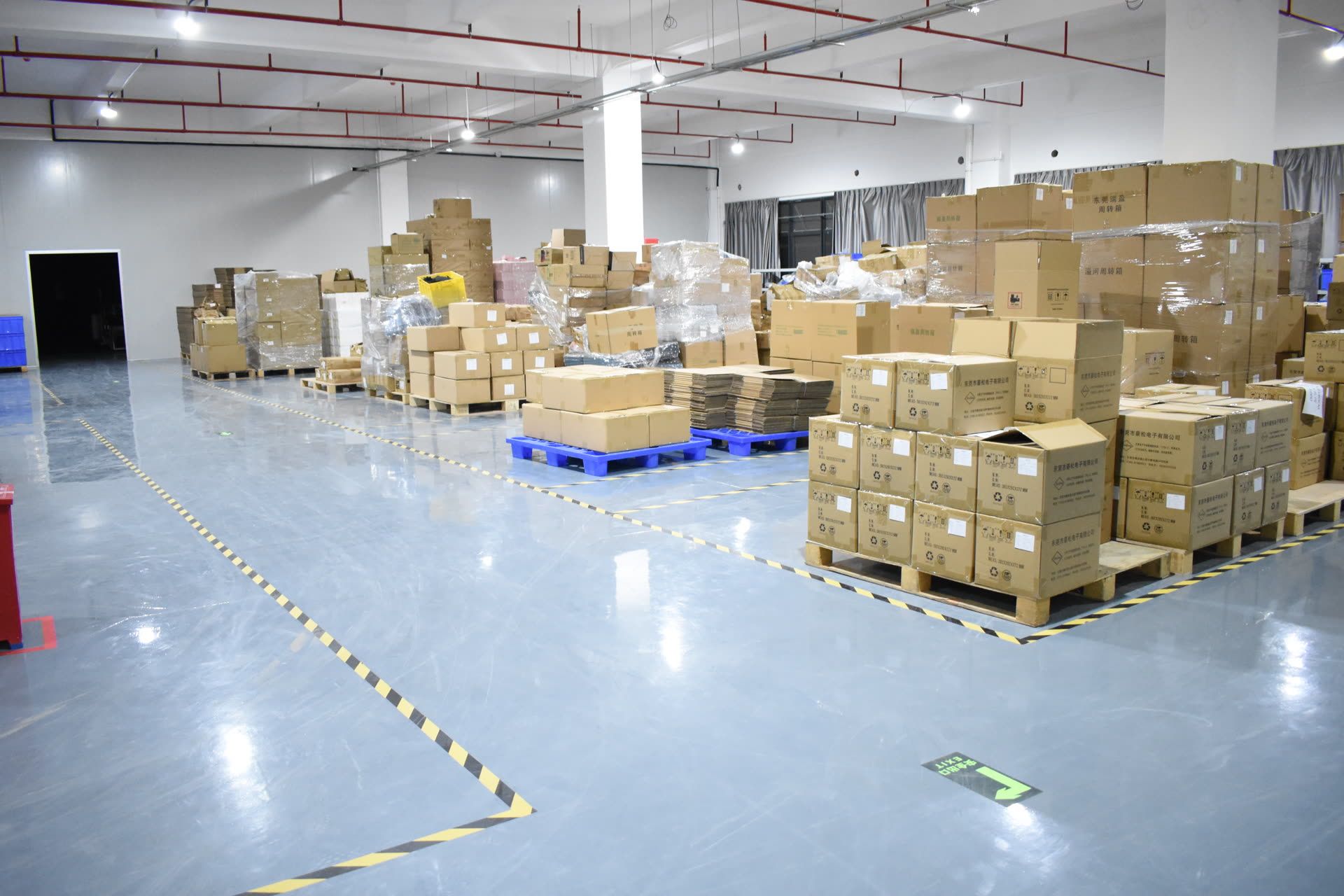 Finished-goods warehouse with palletized export cartons